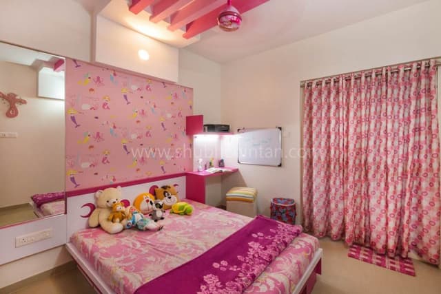 Pink-Coloured-Childrens-Bedroom-with-Wooden-Double-Bed-Wooden-Headboard-Bed-Back-Wall-with-Barbie-Themed-Pink-Wallpaper. Swiper Content 0