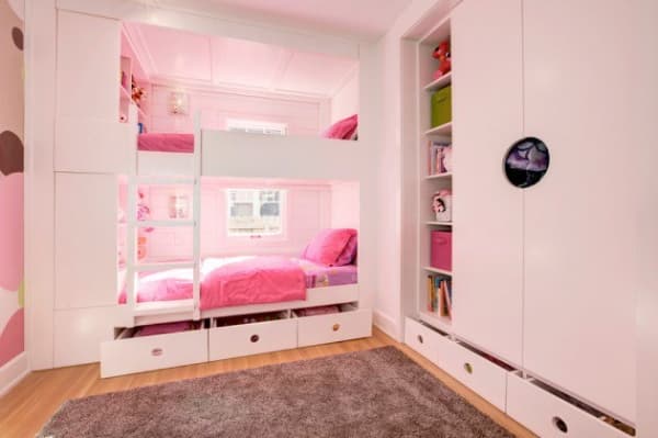 Pink-White-Themed-Children-Bedroom-with-Wooden-Flooring-incorporates-Wooden-Twin-Bunk-Bed-with-Storage-Openable-Built-in-Wardrobe-with-Shelves-and-Drawers-in-Bottom-and-Shaggy-Rug. Swiper Content 0