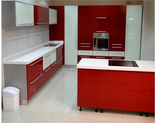 Red-White-Single-Wall-Island-Kitchen-having-White-Corian-Countertops-with-SS-Single-Bowl-Sink. Design Detail Banner 0