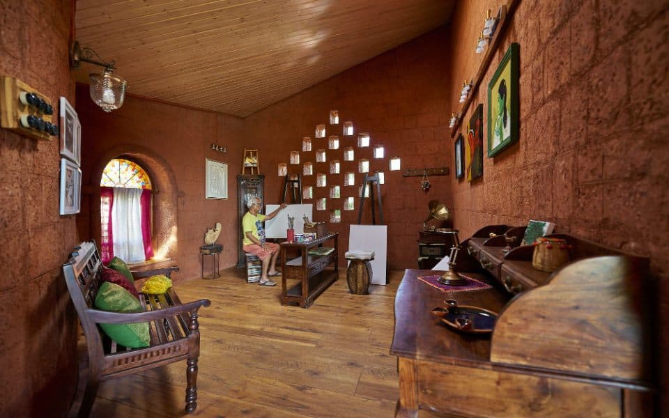 Rustic-Styled-Recreational-Room-designed-with-Wooden-Framed-Bench-with-Cushions Design Detail Banner 0