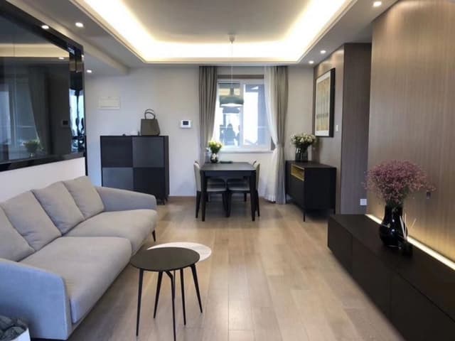 Small-Modern-Living-Room-accommodating-Square-Armed-Light-Grey-Coloured-Sofa Swiper Content 0