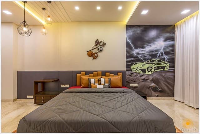 Teen-Male-Bedroom-incorporating-Wooden-Double-Bed-with-Storage-below-Upholstered-Headboard-Wooden-Side-Tables-Ceiling-Fitted-3D-Car-Wallpaper-1 Swiper Content 0