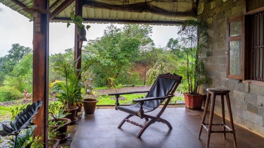 The-Beautiful-Traditional-Home-has-a-Verandah-as-an-Extended-Space-toward-Home-Garden Home Garden