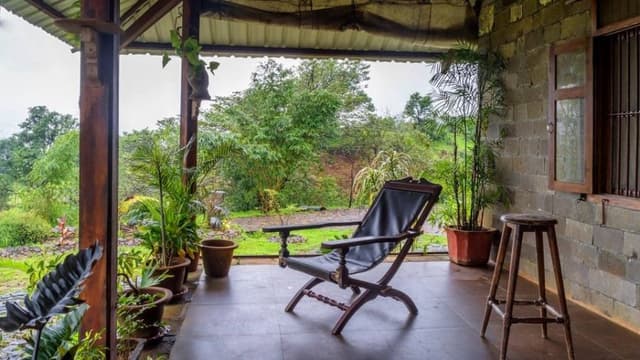 The-Beautiful-Traditional-Home-has-a-Verandah-as-an-Extended-Space-toward-Home-Garden Home Garden