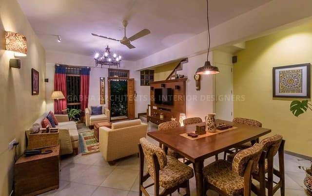 The-Dining-Space-in-an-Open-Living-Room-goes-well-with-the-Play-of-Woods Swiper Content 1