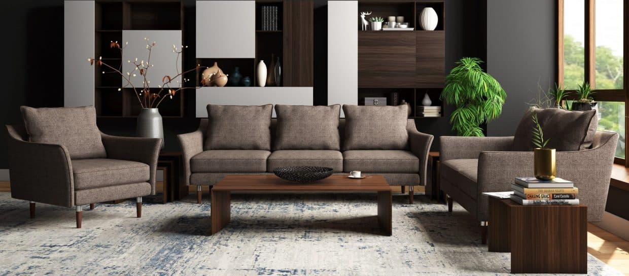 The-Living-Room-Consists-of-3-Single-Seater-Upholstered-Sofa-having-High-Curved-shaped-Armrests-with-Wooden-S.S.-Legs.-scaled-1 Design Detail Banner 0