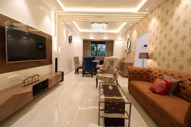 The-Living-Room-having-a-Combination-of-Beige-Brown-with-White-Walls-Ceiling. Swiper Content 0