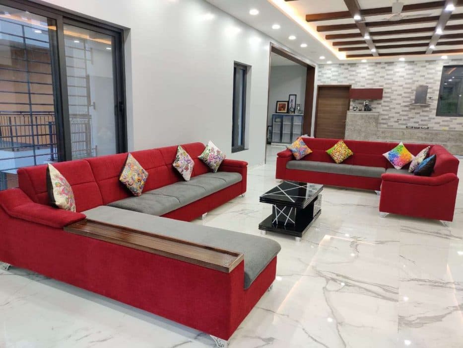 The-Sectional-Sofa-Set-having-Maroon-Grey-Colour-Combination-with-Metal-Legs-are-making-Contrast-with-White-Living-Room. Design Detail Banner 0