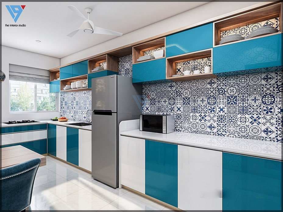 This-Kitchen-has-an-L-Shape-Counter-Top-Finish-with-White-Stone. Design Detail Banner 0