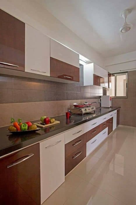 This-Linear-Kitchen-consists-Black-Granite-Platform-2-Burner-Gas-Stove-S.S.-Single-Bowl-Sink. Design Detail Banner 0