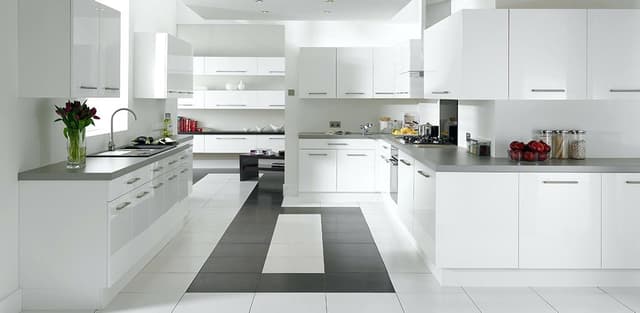 This-Luxurious-Kitchen-has-Multiple-Kitchen-Counters.-Linear-Counter-consists-of-Single-Bowl-S.S.-Sink-with-Drainboard. Swiper Content 0