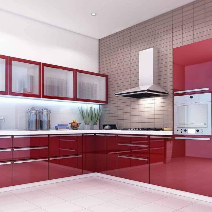 This-Modular-Kitchen-has-a-Combination-of-Red-White-consists-White-Countertop-Built-in-Four-Burner-Gas-Stove-with-Chimney-Oven-Unit. Design Detail Banner 0