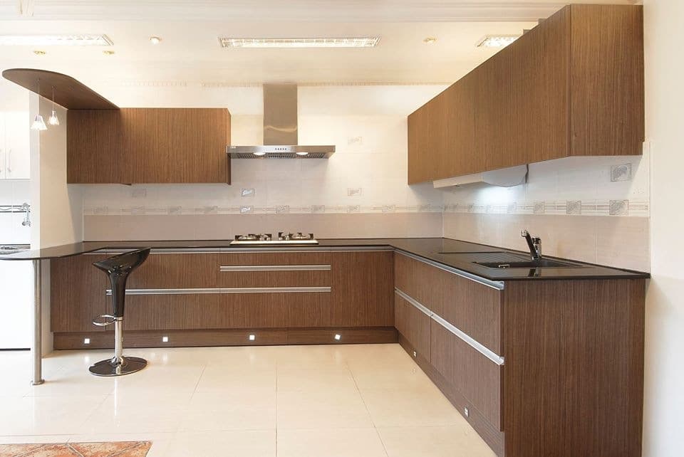 This-Monochromatic-Kitchen-has-L-Shape-Black-Kitchen-Countertop Design Detail Banner 0