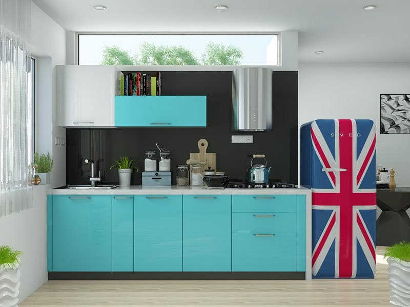 This-Small-Kitchen-Consists-White-Linear-Kitchen-Counter-having-4-Burner-Built-in-Gas-Stove-with-Circular-Chimney-Single-Bowl-S.S.-Sink. Design Detail Banner 0