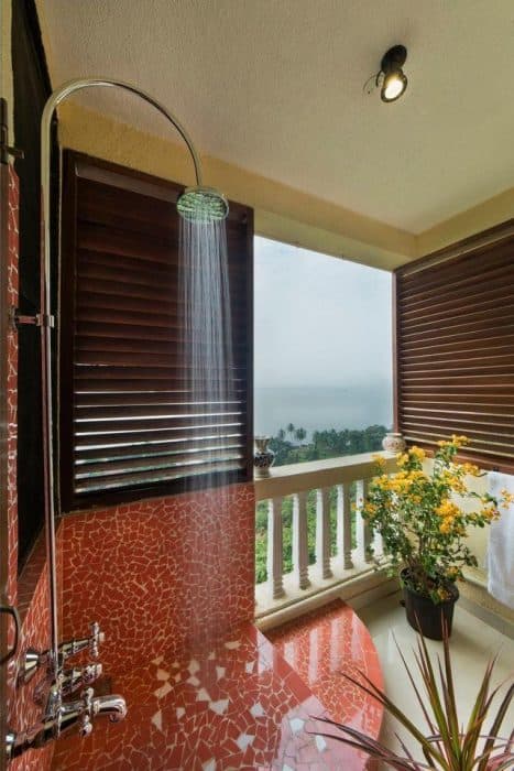 This-Terracotta-Colour-Terrazzo-Finish-in-Shower-Space-Connecting-with-Outdoor-Bathroom-Surrounded-By-Nature. Outdoor Bathroom