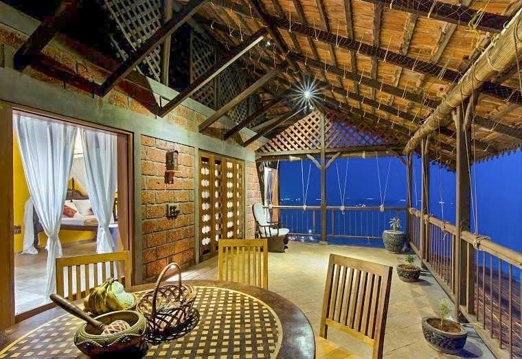 This-Vernacular-Style-Beach-Side-Balcony-having-Laterite-Stone-Wall-Rustic-Stone-Flooring.-1 This Vernacular Style Beach Side Balcony