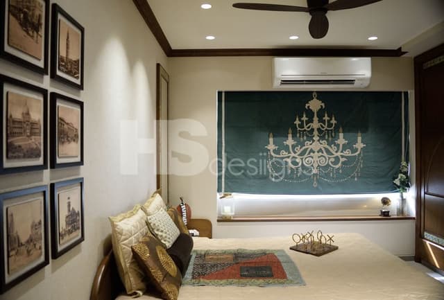 Traditional-Bedroom-accommodating-Wooden-Bed-with-Wooden-Side-Tables-Wooden-Headboard-Rectangular-Mirror-with-Traditional-Wooden-Frame-Collage-of-6-Wall-Paintings-Wooden-Wardrobe. Swiper Content 0