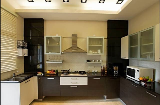 U-Shaped-Kitchen-with-Lower-Kitchen-Cabinets-with-Stainless-Steel-Handles. Swiper Content 0