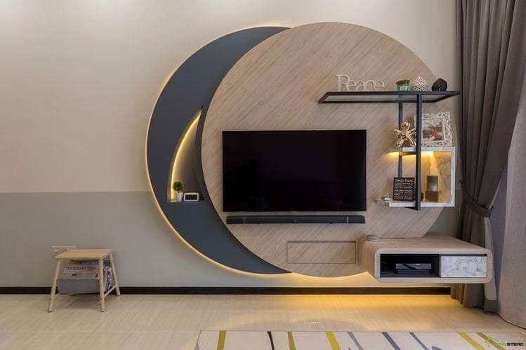 Unique-TV-Unit-with-Intersecting-Circular-Wooden-Panelling-highlighted-by-Cove-Lights Design Detail Banner 0