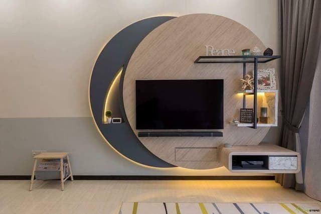 Unique-TV-Unit-with-Intersecting-Circular-Wooden-Panelling-highlighted-by-Cove-Lights Swiper Content 0