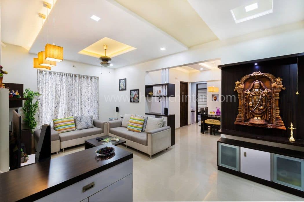 White-Coloured-Small-Living-Room-designed-with-Wall-Mounted-T.V.-Unit-Square-Armed-Sectional-Sofa. Design Detail Banner 0