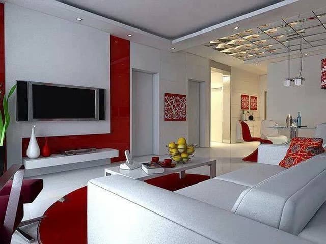 White-Red-Themed-Living-Room-accommodating-Square-Armed-3-Seater-Sofa-Wooden-Coffee-Table-placed-on-a-Rug-Wall-mounted-T.V.-Unit Swiper Content 0