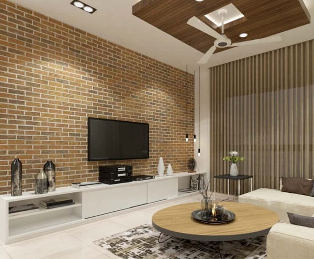 White-T.V.-Unit-having-Linear-Unit-with-Combination-of-Open-Closed-Shelves.-Exposed-Brick-Texture-on-Wall-with-Spot-Light-in-the-Ceiling-is-allowing-to-highlight-the-T.V.-Unit. Swiper Content 0