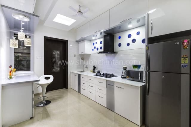 White-Themed-Kitchen-with-Single-Wall-Kitchen-Counter Swiper Content 1