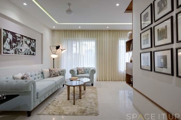 White-Themed-Living-Room-accommodating-Roll-Arm-Button-Tufted-Tuxedo-Sofa-Set.-4 Design Detail Banner 0