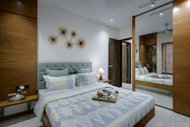 White-Wooden-Themed-Contemporary-Bedroom-designed-with-Wooden-Bed-Button-Tufted-Headboard-Side-Tables-with-Table-Lamp-placed-on-it-1 Swiper Content 0