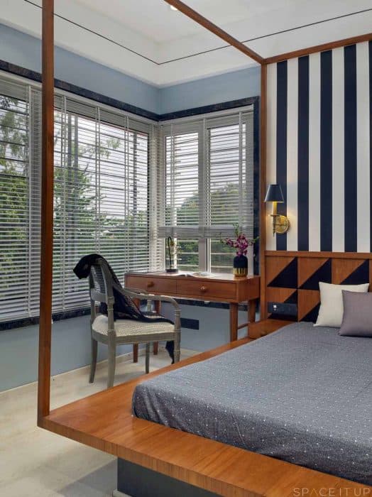 Wooden-Canopy-Platform-Bed-Wooden-Headboard-Bed-Back-Wall-highlighted-with-White-Navy-Blue-Strip-Wallpaper Design Detail Banner 0