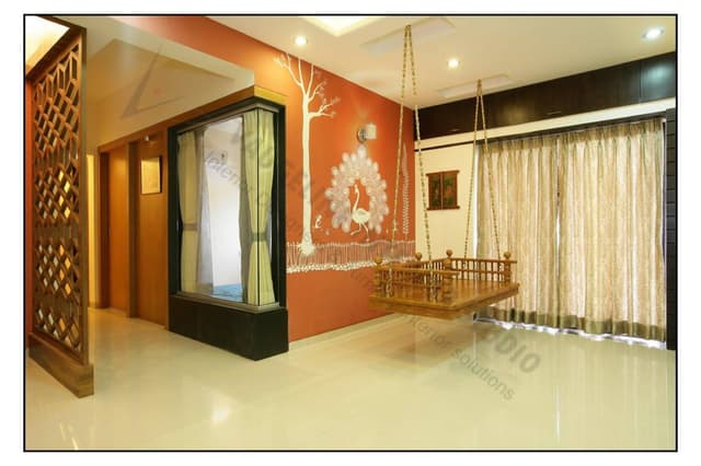 Wooden-Swing-with-a-Metal-Strings-attached-to-the-ceiling-in-Living-Room.-Orange-Coloured-Backwall-consists-of-a-Peacock-01 Swiper Content 0