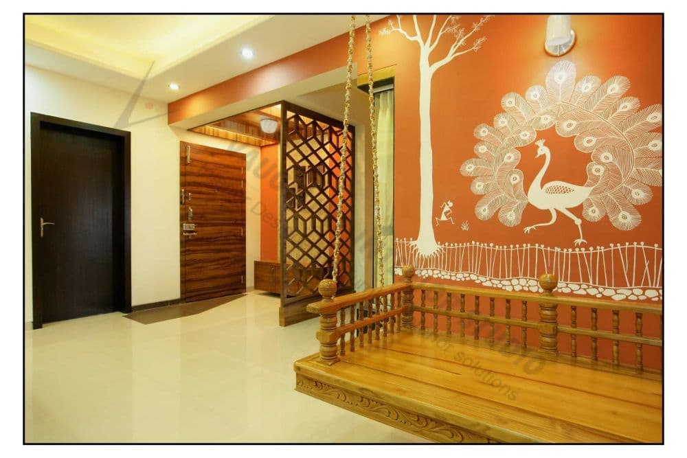 Wooden-Swing-with-a-Metal-Strings-attached-to-the-ceiling-in-Living-Room.-Orange-Coloured-Backwall-consists-of-a-Peacock-02 Design Detail Banner 1