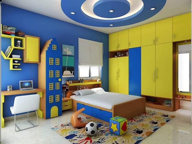Yellow-Blue-Theme-Children-Bedroom-accommodates-Wooden-Double-Bed-High-rise-House-Shaped-Cupboard-for-Storage-Wooden-Openable-Wardrobe-with-Open-Display-Boxes Yellow & Blue Theme Children Bedroom accommodates Wooden Double Bed