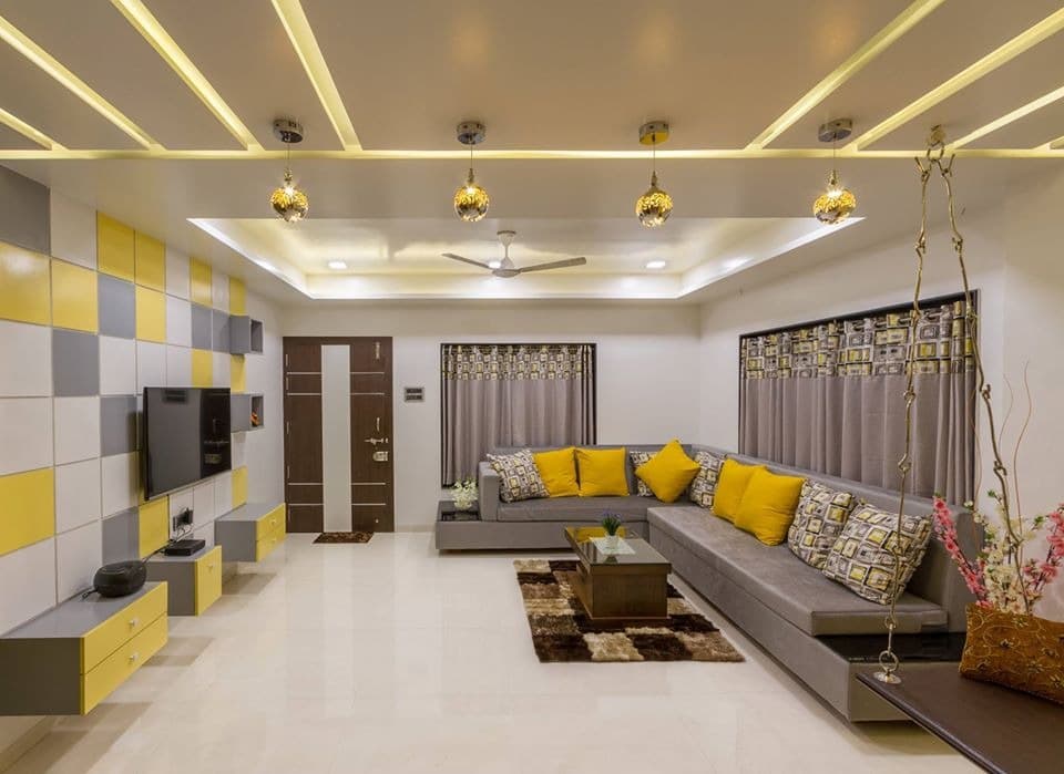 Yellow-Grey-White-Themed-Living-Room-incorporates-L-Shaped-Upholstered-Sectional-Sofa-with-Attached-Side-Tables. Design Detail Banner 0