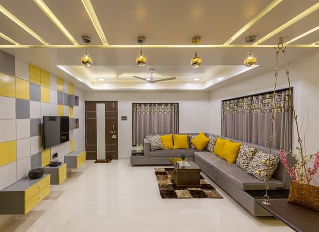 Yellow-Grey-White-Themed-Living-Room-incorporates-L-Shaped-Upholstered-Sectional-Sofa-with-Attached-Side-Tables. Swiper Content 0