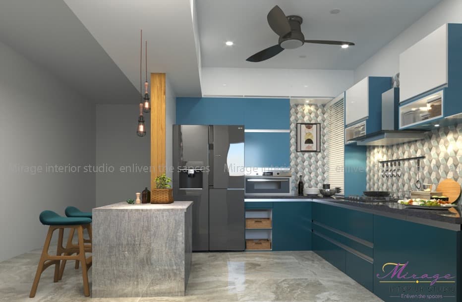 A modern looking kitchen having mix match colour of grey and blue with L-shaped kitchen platform A modern looking kitchen having mix match colour of grey and blue with L-shaped kitchen platform