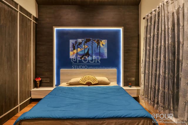 A modern designed bedroom in shades of blues and browns A modern designed bedroom in shades of blues and browns
