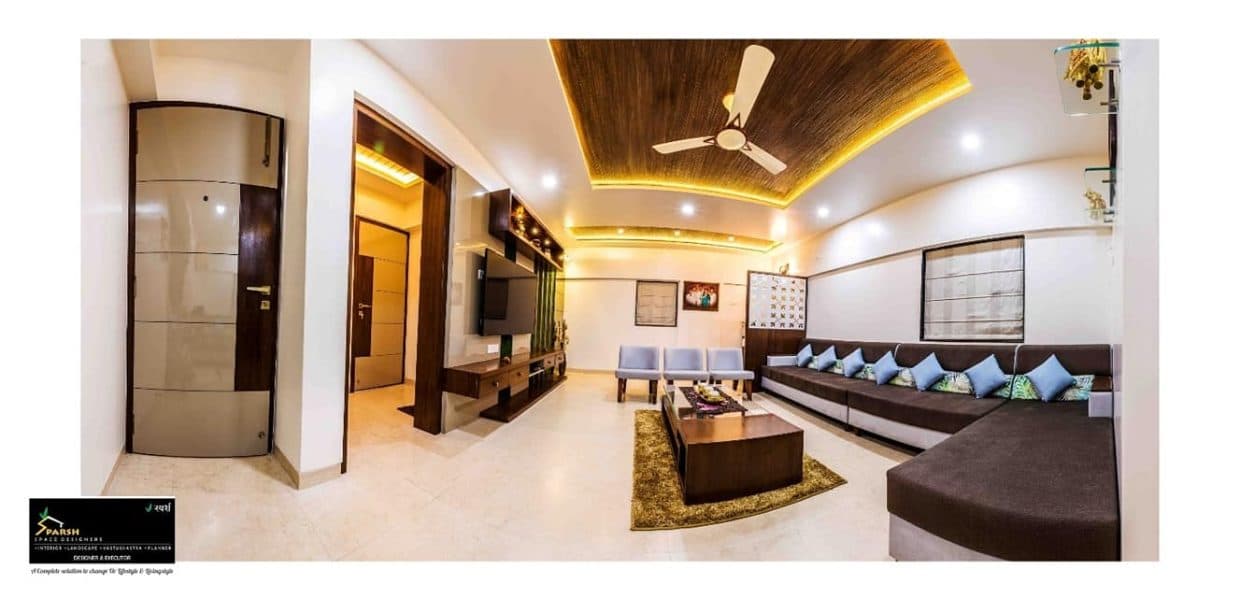 A living room in whites and brown with modern setup A living room in whites and brown with modern setup