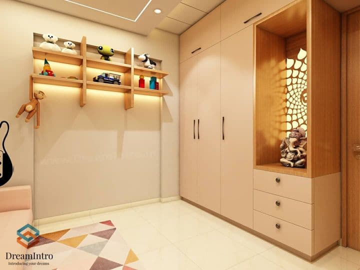 A cozy corner of the house with a wooden cupboard and pooja space A cozy corner of the house with a wooden cupboard and pooja space