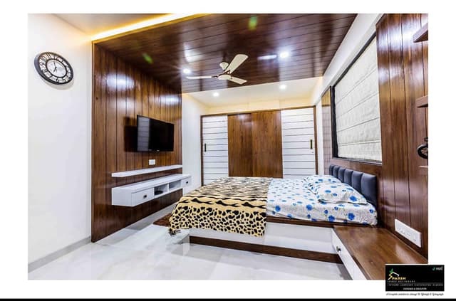 A modern minimalistic bedroom in white and darker shade of wood A modern minimalistic bedroom in white and darker shade of wood