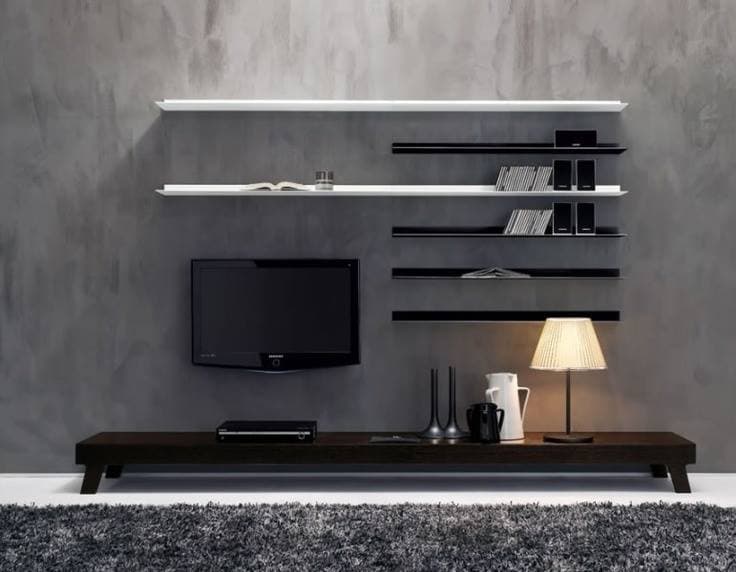 A brown wash effect wall with a full TV unit A brown wash effect wall with a full TV unit