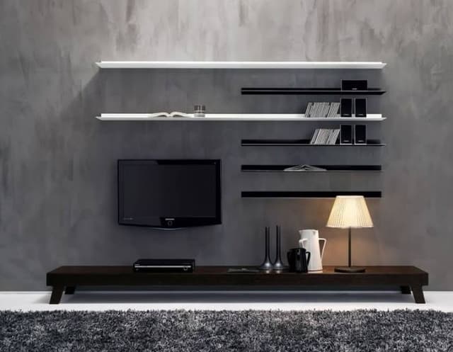 A brown wash effect wall with a full TV unit A brown wash effect wall with a full TV unit