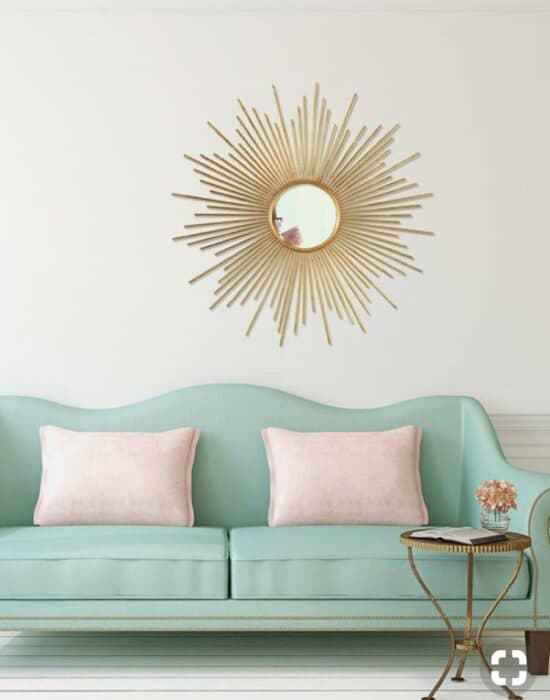 2 Seater Camelback Sofa having Pale Green Rexine Upholstered with Wooden Legs is Placed with Circular Metal Table 2 Seater Camelback Sofa having Pale Green Rexine Upholstered with Wooden Legs is Placed with Circular Metal Table