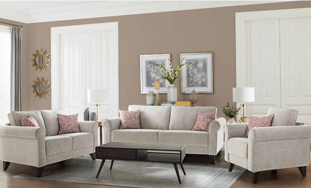 Light Grey Upholstered Sofa having Wooden Legs & Round Armrest is Nicely placed in this Living Room Light Grey Upholstered Sofa having Wooden Legs & Round Armrest is Nicely placed in this Living Room