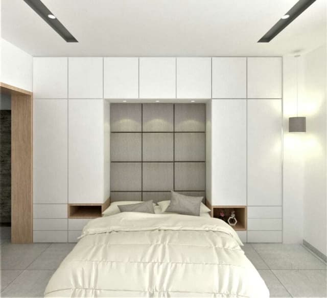 The Bedroom Consists Bed with White Bedsheet The Bedroom Consists Bed with White Bedsheet