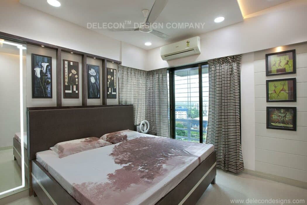 The Bedroom Consists Rectangular Brown Bed with Brown Cushioned Backrest – 1 The Bedroom Consists Rectangular Brown Bed with Brown Cushioned Backrest - 1