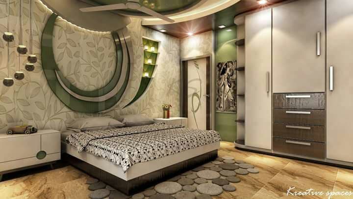 The Bedroom having a Black & White Rectangular Bed with Side Table on Both sides The Bedroom having a Black & White Rectangular Bed with Side Table on Both sides