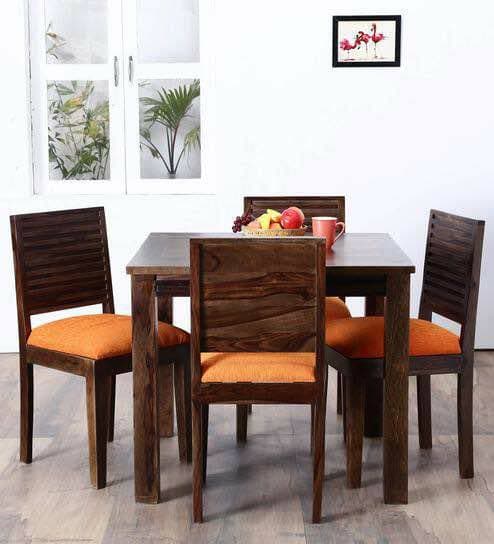 A 4 Seater Dining Table has Wooden Table A 4 Seater Dining Table has Wooden Table