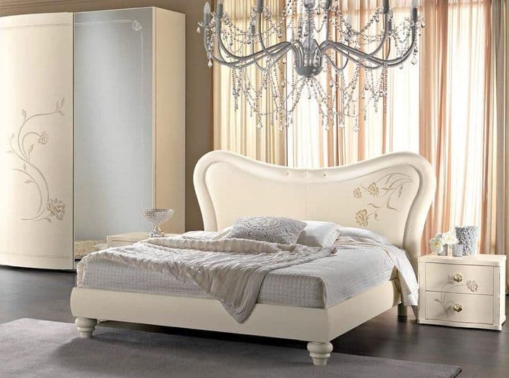 The Bedroom having a Combination of Off White & Grey consists of Ultra luxurious Wooden Bed & Traditional Style Wooden Legs The Bedroom having a Combination of Off White & Grey consists of Ultra luxurious Wooden Bed & Traditional Style Wooden Legs